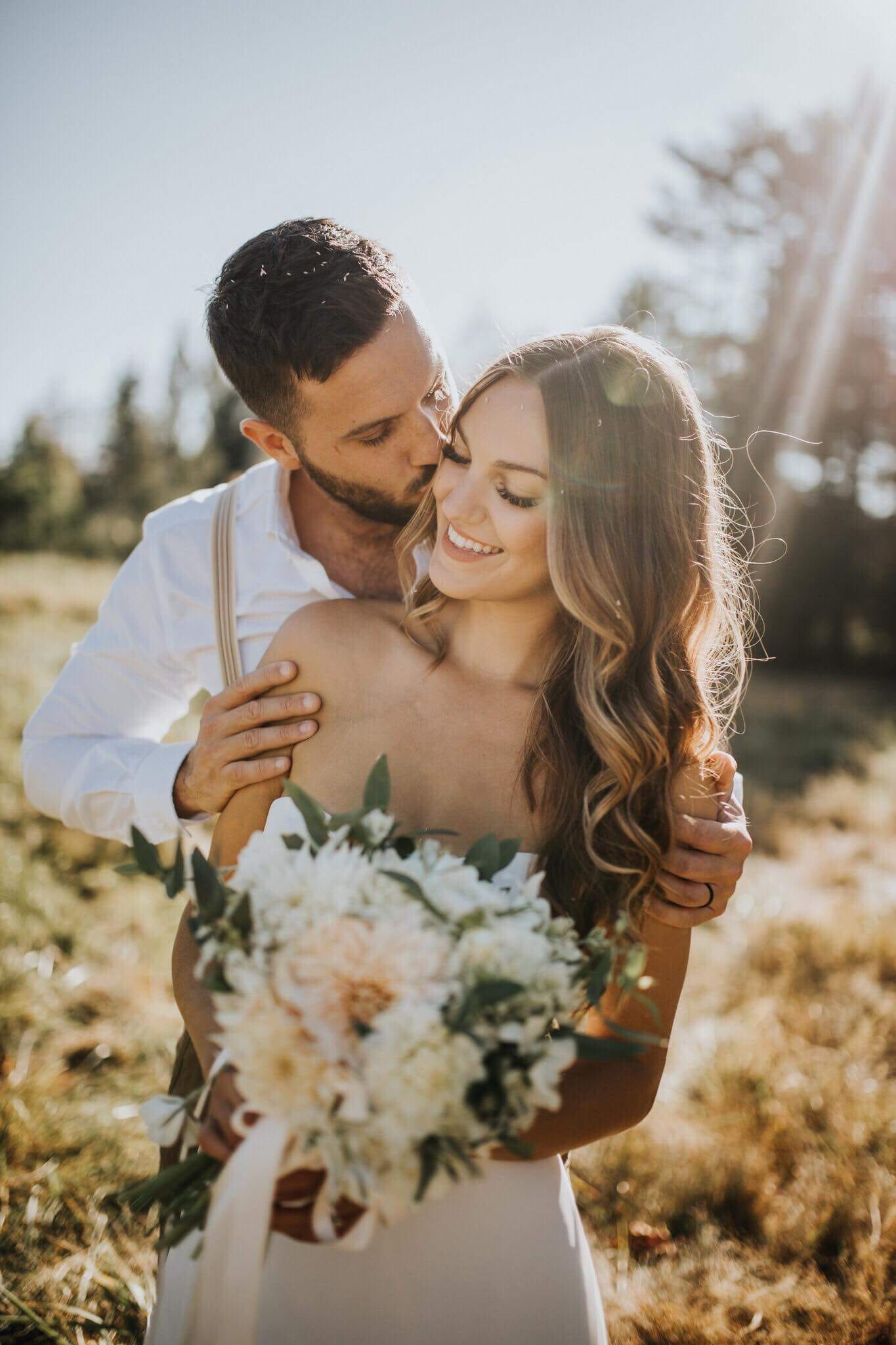 Bride with flowing waves and bouquet